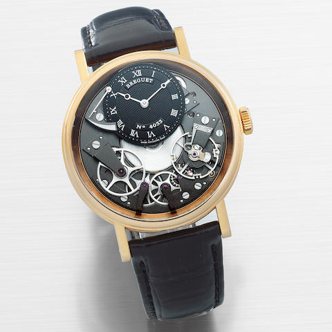 Breguet. A fine 18K gold manual wind openwork wristwatch with power reserve indication  La Tradition, Ref: 7057, Circa 2010