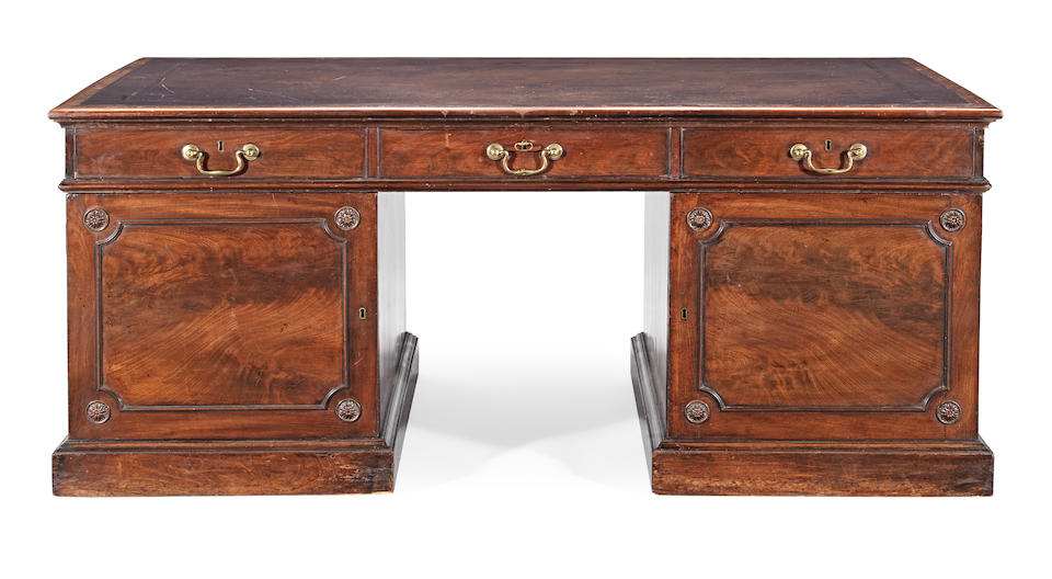A George II mahogany partner's desk In the manner of Thomas Chippendale