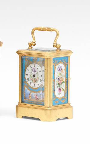 A good late 19th century French miniature carriage timepiece with four porcelain panels Numbered 1121 2