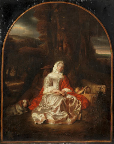 Samuel van Hoogstraten (Dordrecht 1627-1678) A shepherdess and shepherd resting beneath a tree, within a painted arched frame