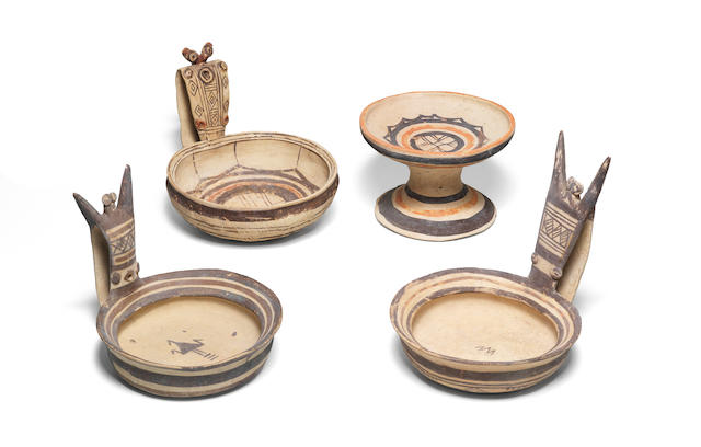 Three Daunian pottery kyathoi and a Daunian pedestal dish 4