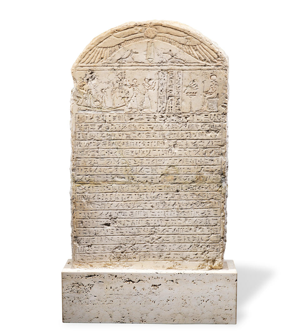 An Egyptian limestone round-topped stele for Padi-Bast