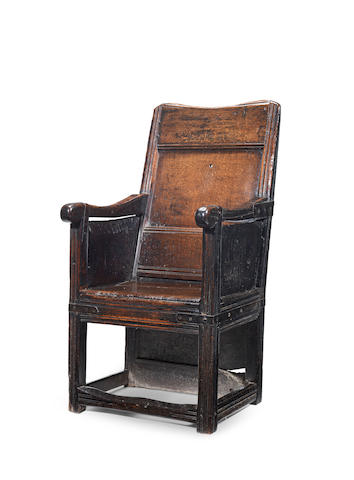 A James I/Charles I joined oak enclosed armchair, circa 1620-40