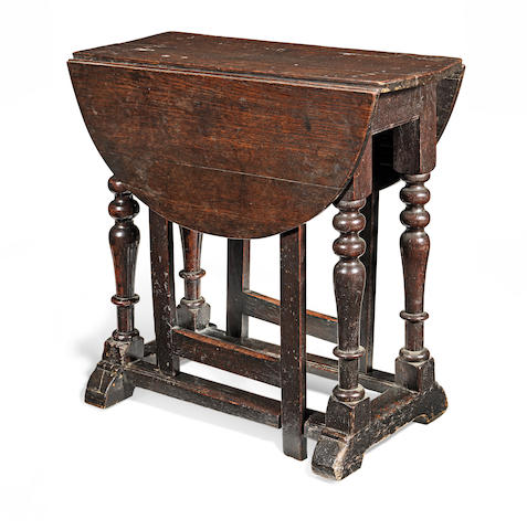 A 17th century joined oak gateleg occasional table, circa 1675