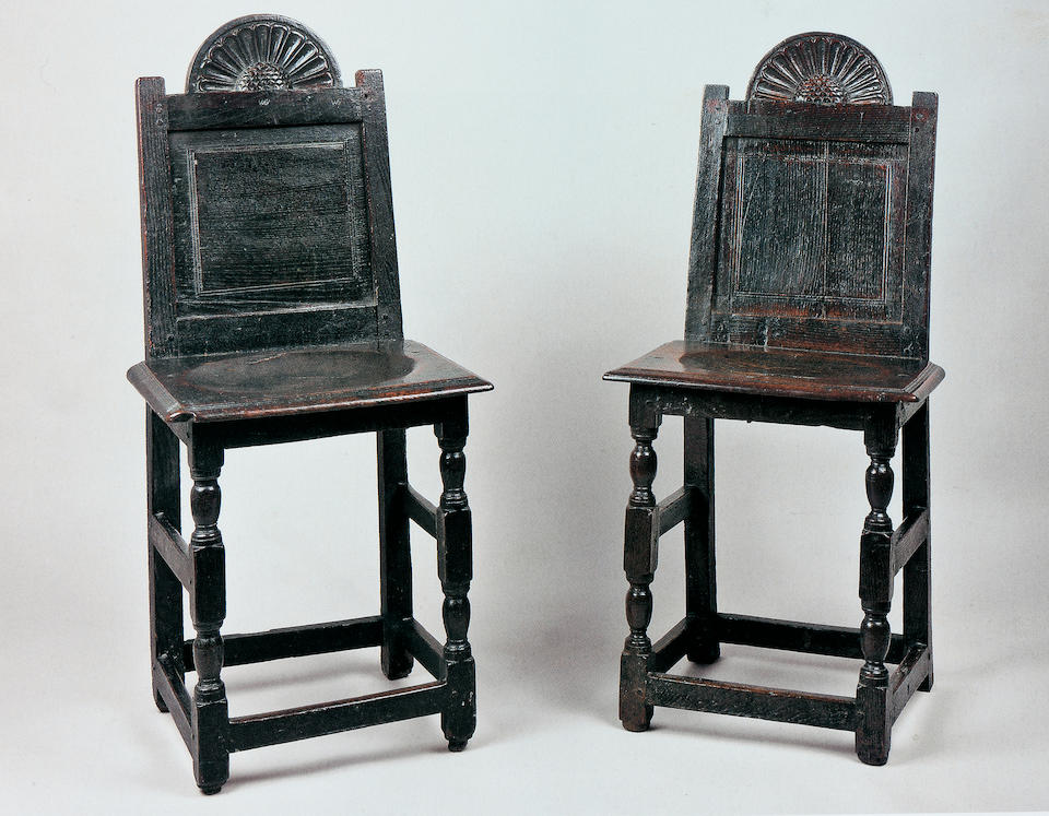 An extremely rare and documented pair of James I joined oak backstools, circa 1620