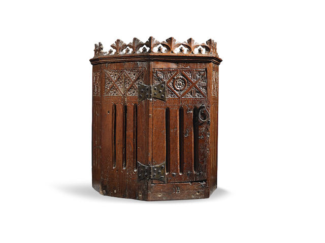 An exceptionally rare small boarded oak ventilated mural cupboard, circa 1450-1500, English or Flemish Possibly a tabernacle