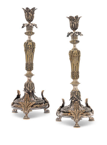 A pair of bronze and silver plated candlesticks  By Christofle (2)