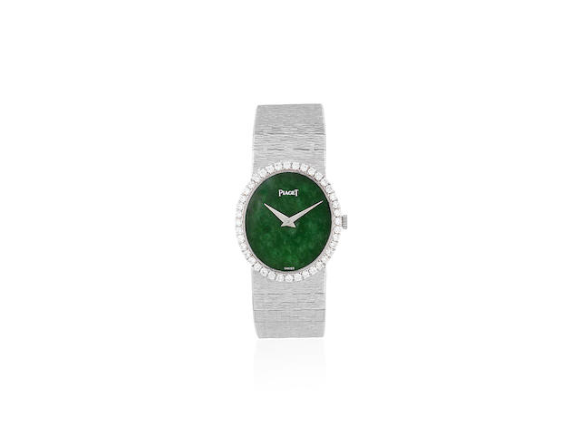 Piaget. A lady's 18K white gold and diamond set oval bracelet watch with green hardstone dial Ref: 9826 A6, Circa 1970