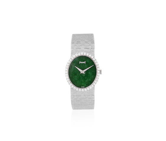 Piaget. A lady's 18K white gold and diamond set oval bracelet watch with green hardstone dial Ref: 9826 A6, Circa 1970