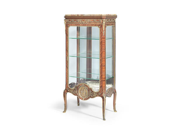 A French late 19th/early 20th century gilt bronze mounted kingwood vitrine attributed to Francois Linke (1855-1946)