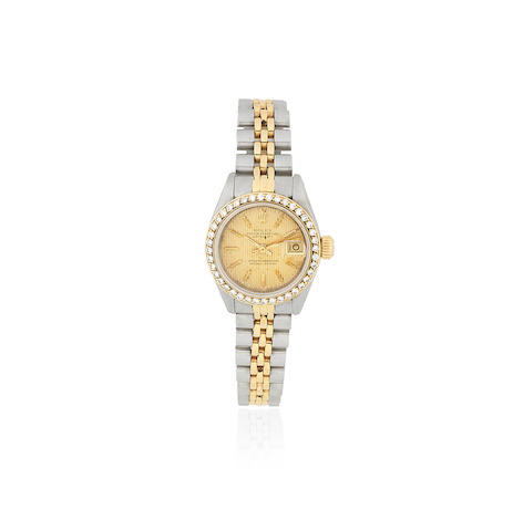 Rolex. A lady's stainless steel and gold diamond set automatic calendar bracelet watch  Datejust, Ref: 69173, Circa 1986