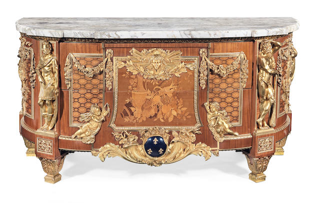 A fine French early 20th century mahogany, fruitwood marquetry and gilt bronze mounted commode in the Louis XVI style, after the original by Jean-Henri Reisener