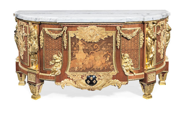 A fine French early 20th century mahogany, fruitwood marquetry and gilt bronze mounted commode in the Louis XVI style, After the original by Jean-Henri Reisener