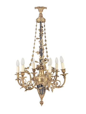A French late 19th century gilt bronze and enamel six light chandelier together with a pair of matched twin branch wall lights After a design by Pierre Gouthi&#232;re