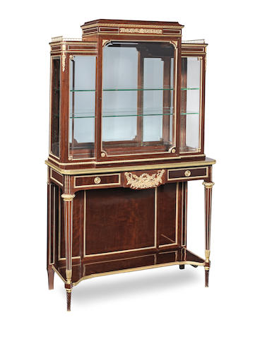 A French late 19th century mahogany and gilt bronze mounted vitrine By Paul Sormani