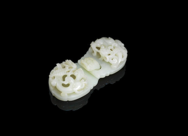 A pale green jade 'chilong' double buckle 18th century (2)