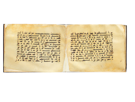 A bound group of ten leaves from six separate suras of a dispersed manuscript of the Qur'an, written in kufic script on vellum Near East or North Africa, 9th Century image 8