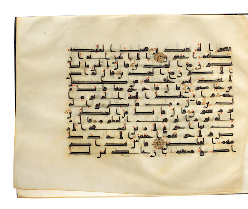 A bound group of ten leaves from six separate suras of a dispersed manuscript of the Qur'an, written in kufic script on vellum Near East or North Africa, 9th Century image 4