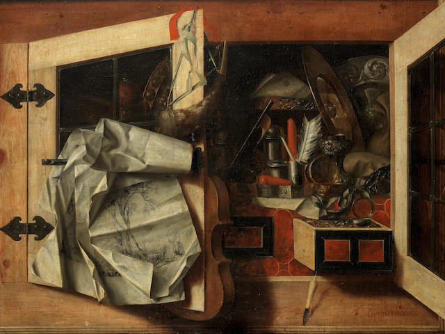 Franciscus Gysbrechts (born Antwerp 1649) A trompe l'oeil still life of a half-open wall cabinet filled with writing implements, silver gilt dishes, a violin, hunting horn