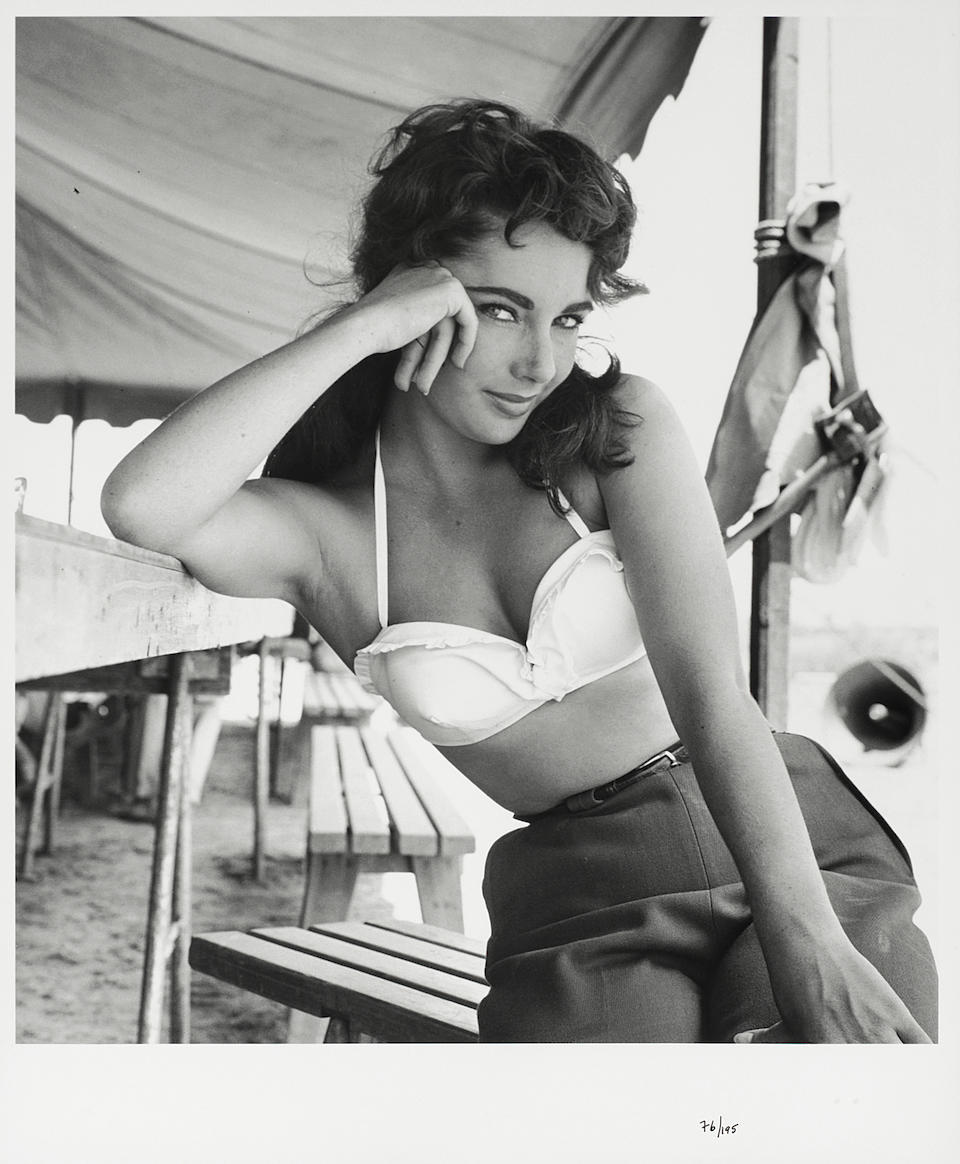 Frank Worth (American, b.1923-d.2000): A black and white photographic print of Elizabeth Taylor, 1956, printed later,