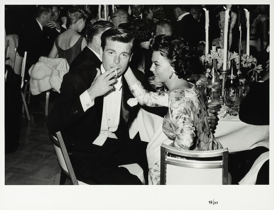Frank Worth (American, b.1923-d.2000): A black and white photographic print of Robert Wagner and Natalie Wood, 1959, printed later,