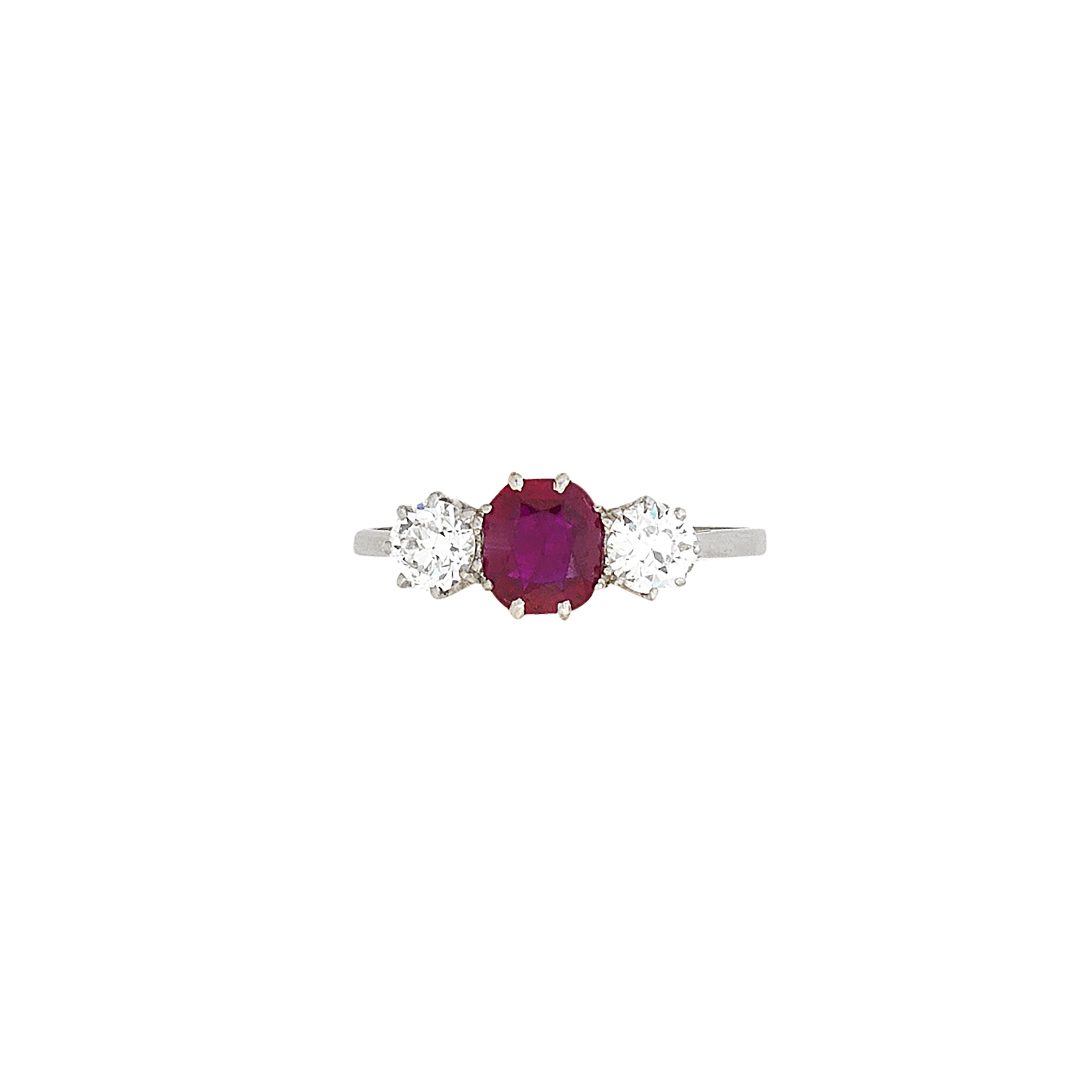 A ruby and diamond three-stone ring