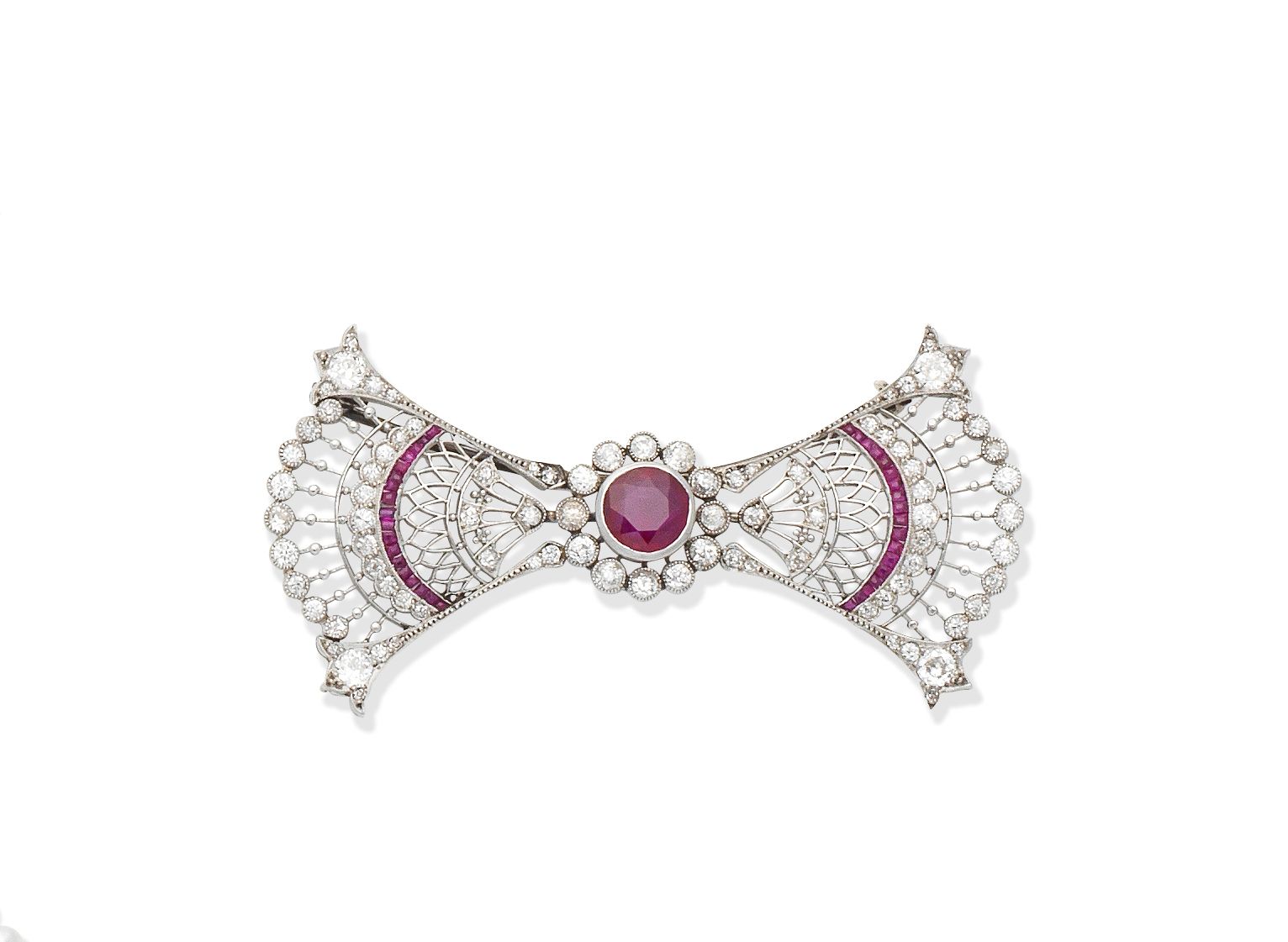 A ruby and diamond bow brooch