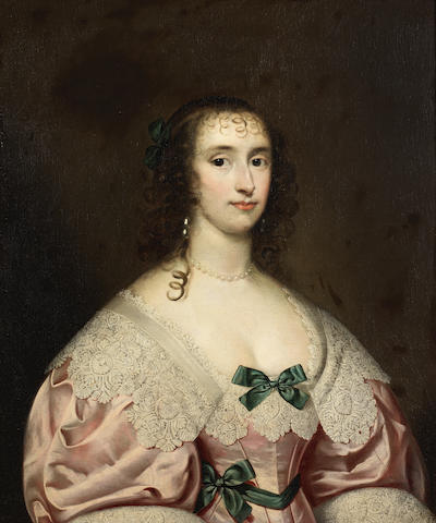 Cornelis Jonson van Ceulen (London 1593-1661 Utrecht) Portrait of a lady, half-length, in a pink dress with blue ribbons