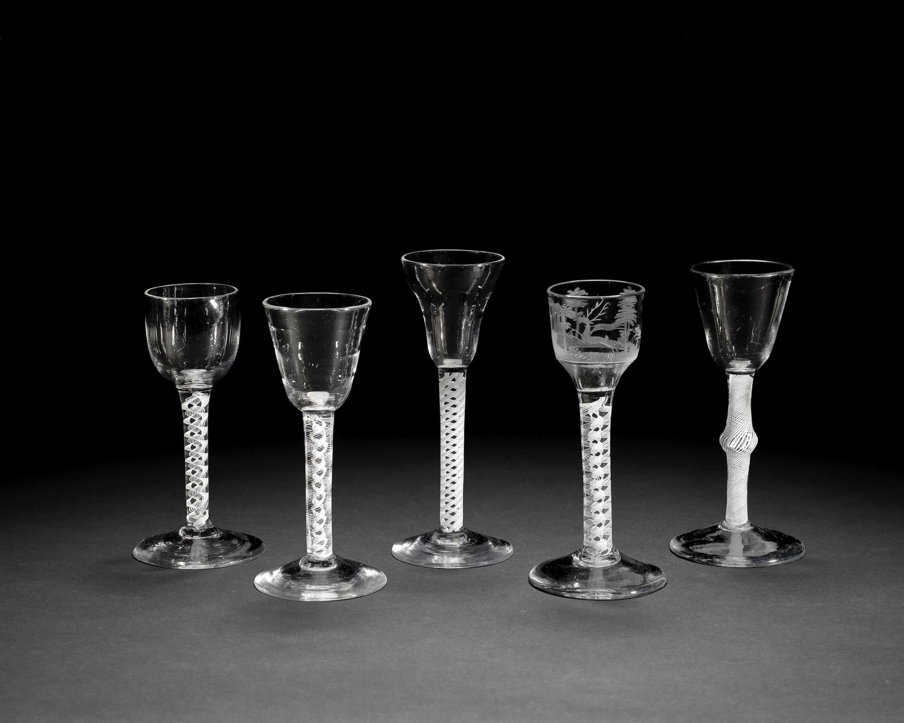 Five opaque twist wine glasses, circa 1760-65