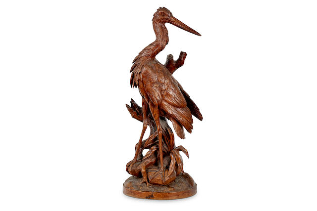 A fine 19th century Swiss carving of a wading heron