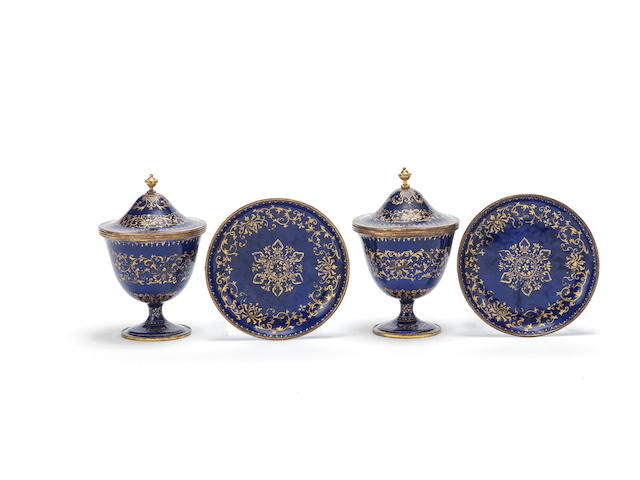 A PAIR OF RARE GILT-DECORATED BLUE-ENAMEL-GROUND STEM CUPS, COVERS AND STANDS 18th century (6)