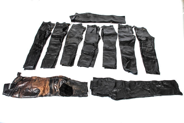 Ten pairs of black leather trousers  ((10))