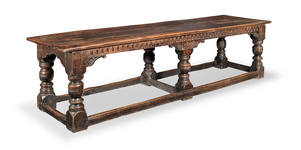 A remarkably rare and good James I joined oak six-leg refectory-type table, circa 1630