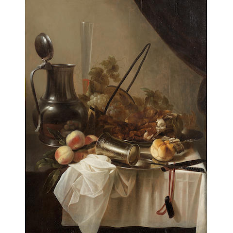Cornelis Kruys (active Haarlem and Leiden 1644- died 1660) A pewter jug with an overturned silver cup with fruit, bread and meat on a draped table-top