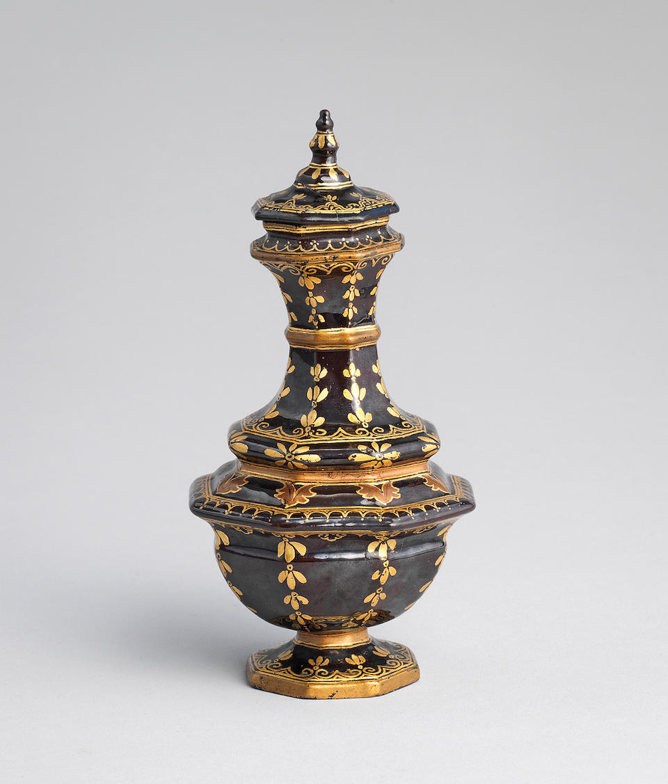 A very rare Meissen B&#246;ttger stoneware black-lacquered octagonal vase and cover, circa 1710-19