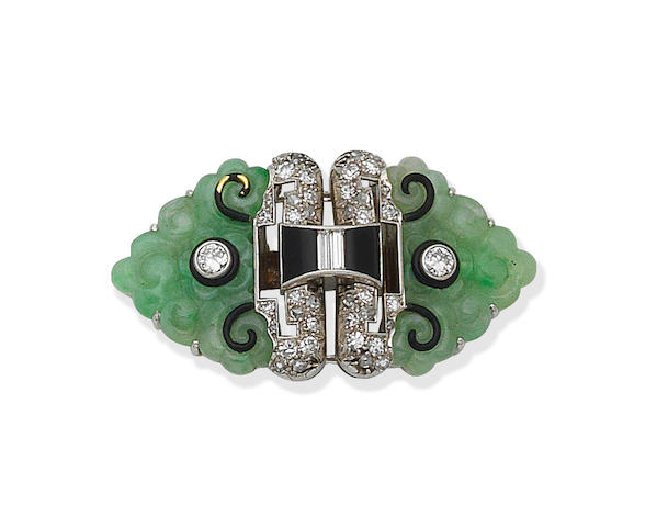 Bonhams : An Art Deco jade, diamond, onyx and enamel clip brooch,