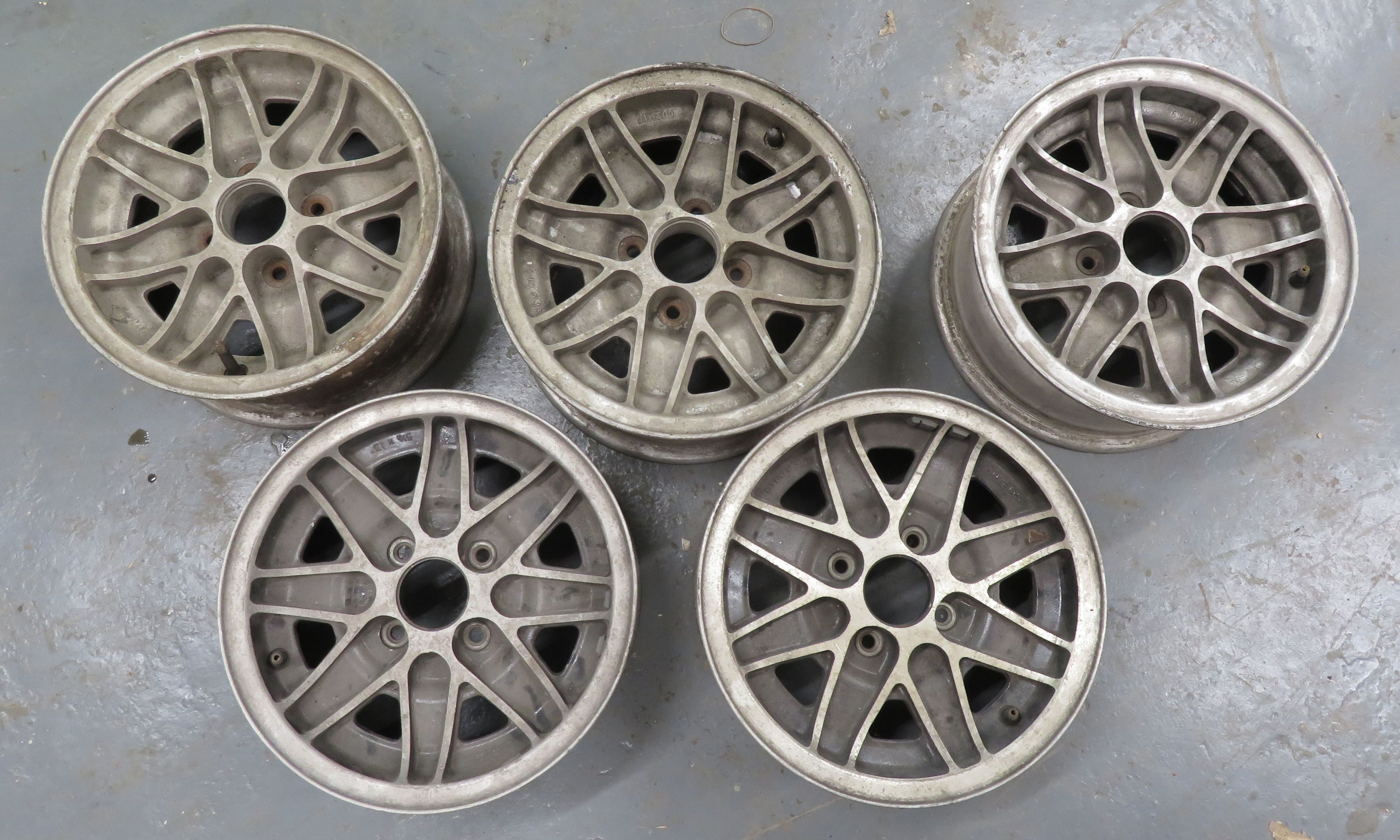Bonhams Cars : Five four-stud 13'' Cosmic (made in England) alloy ...