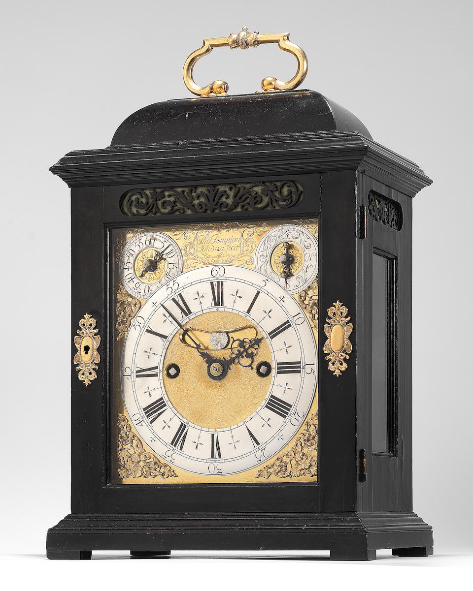A fine and rare early 18th century gilt-metal mounted, ebony-veneered quarter-repeating and striking table clock of small size Thomas Tompion, London, number 345
