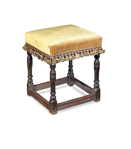 A Charles II and later oak stool