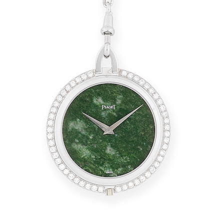 Piaget. A very attractive 18K white gold and diamond set keyless wind open face pocket watch with green hard stone dial January 1973 image 1