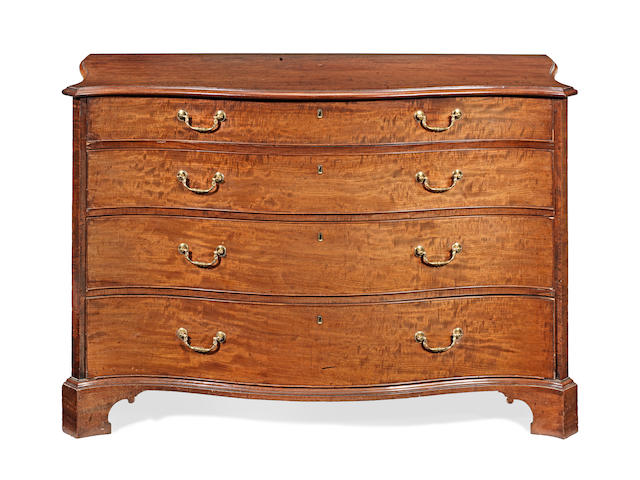 A George III mahogany serpentine commode attributed to Thomas Chippendale (1718-1779)
