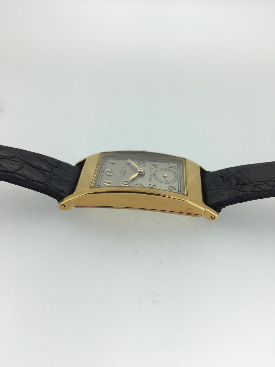 Patek, Philippe & Co, Geneve. A rare double signed 18K gold manual wind rectangular wristwatch retailed by Tiffany & Co.  Tegolino, Retailed by Tiffany & Co., Ref: 425, Sold 21st April 1941