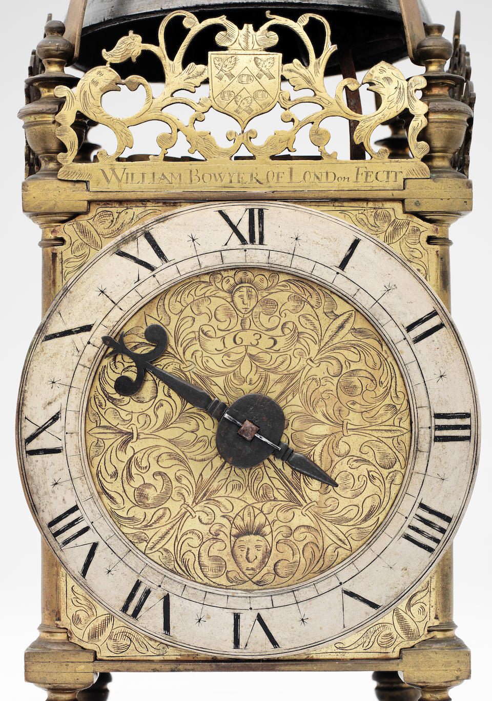 A unique and important dated 17th century lantern clock of large size, engraved with the arms of The Brewers Company William Bowyer, London, dated 1632.  The bell cast with the initials 'KS'
