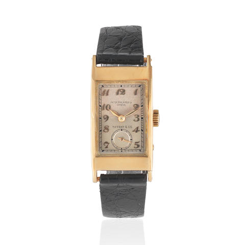 Patek, Philippe & Co, Geneve. A rare double signed 18K gold manual wind rectangular wristwatch retailed by Tiffany & Co.  Tegolino, Retailed by Tiffany & Co., Ref: 425, Sold 21st April 1941