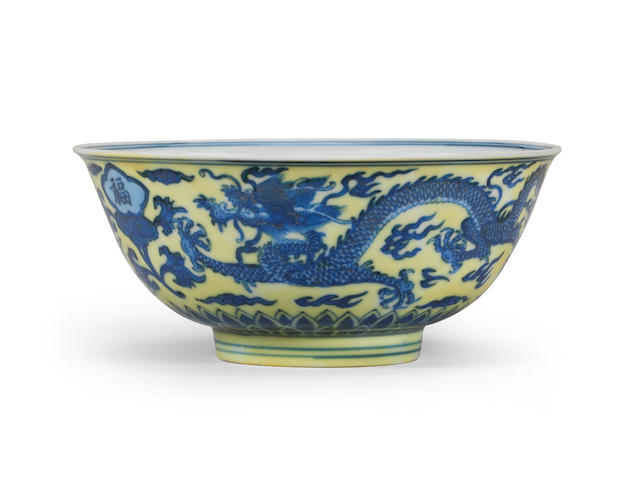 A RARE AND FINE YELLOW-GROUND BLUE AND WHITE 'DRAGON AND RUYI' BOWL Kangxi six-character mark and of the period (2)