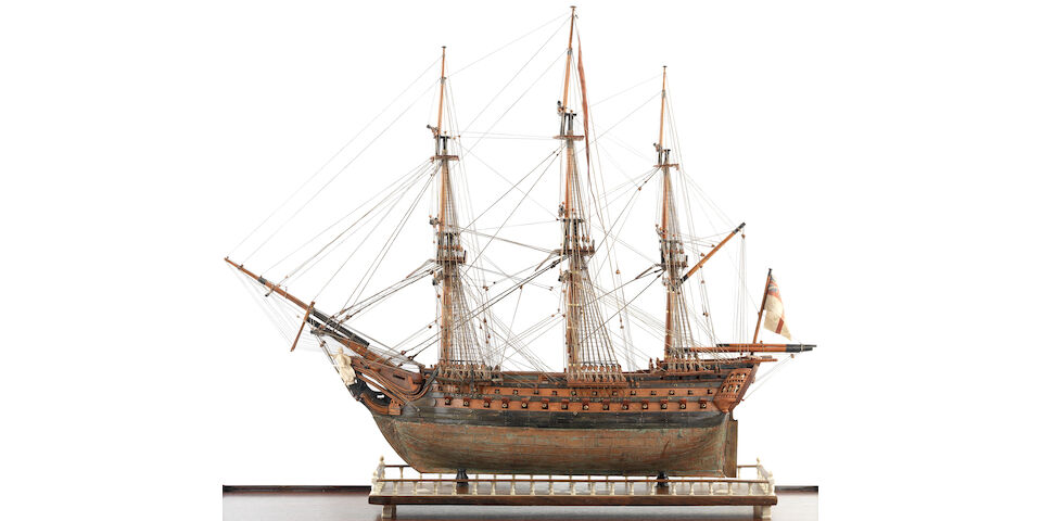 A fine Prisoner-of-War boxwood model of the first class ship of the line HMS Foudroyant, early 19th century, the case 76 x 89 x 39cm (30 x 35 x 15 1/2in).