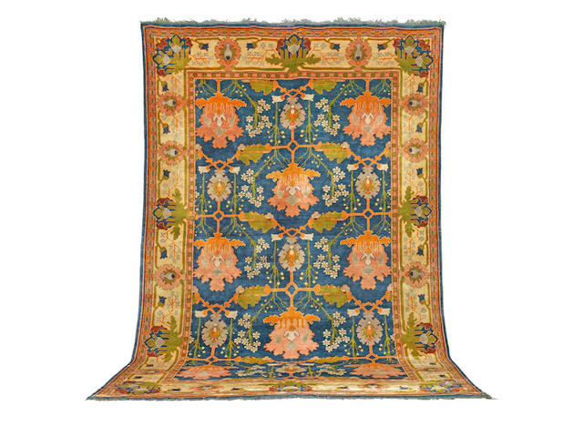 A vibrant Gavin Morton Donegal carpet early 20th century 560cm x 360cm approximately