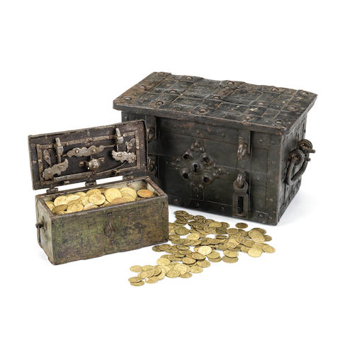 Two 18th century iron strongboxes together with a large number of Victorian brass gaming counters  (Qty)