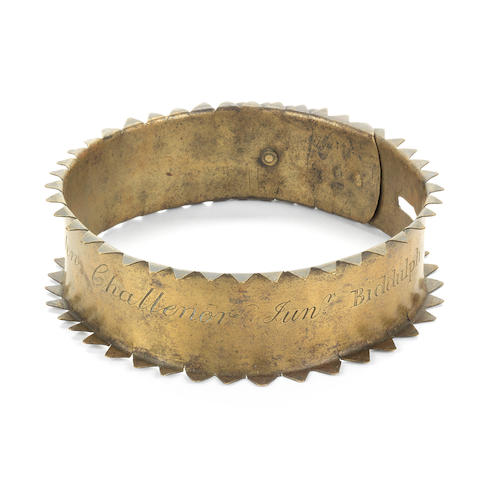 A brass dog collar Early 19th century