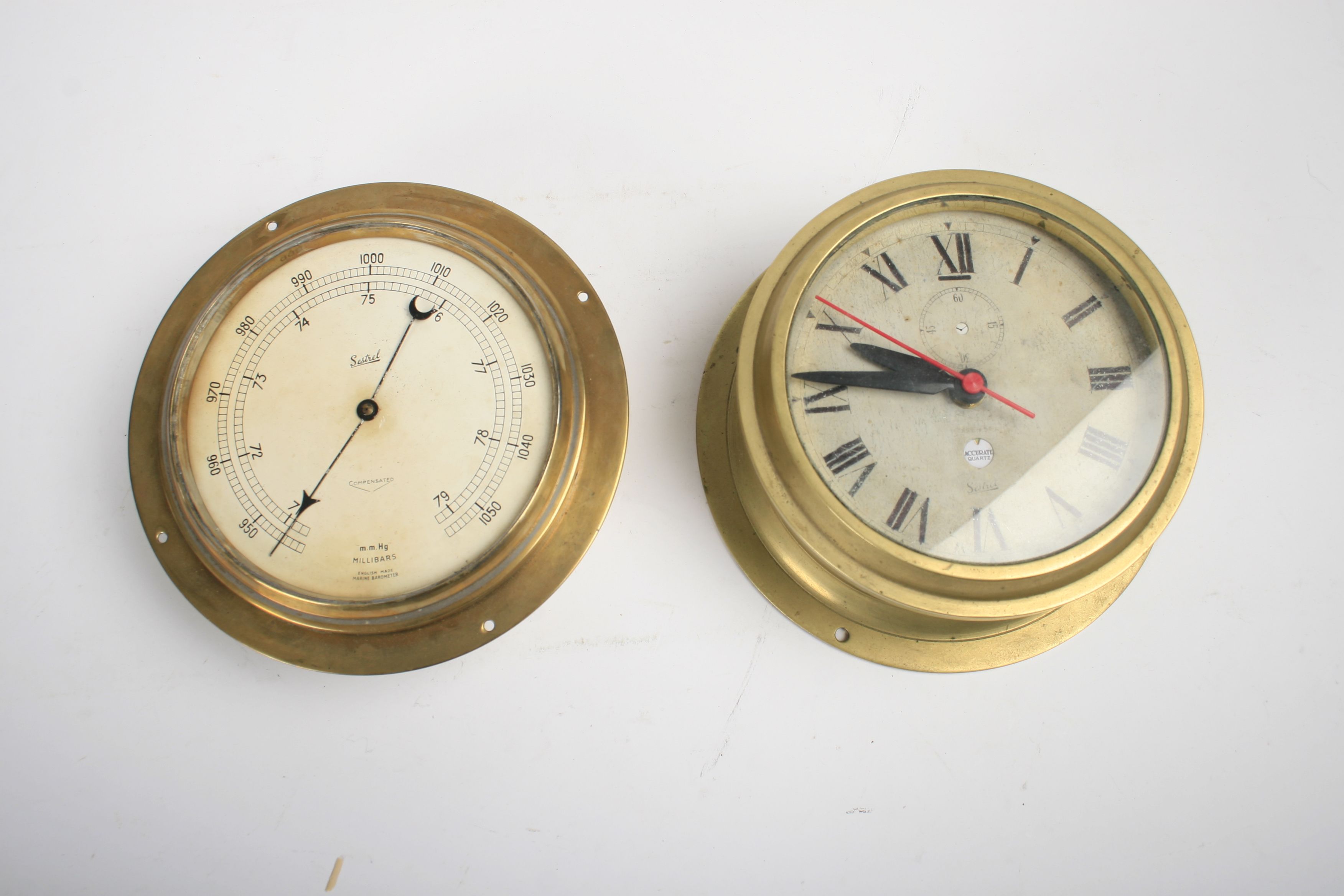 Sestrel Clock Bonhams Cars : A Sestrel marine clock and a barometer, ((2))